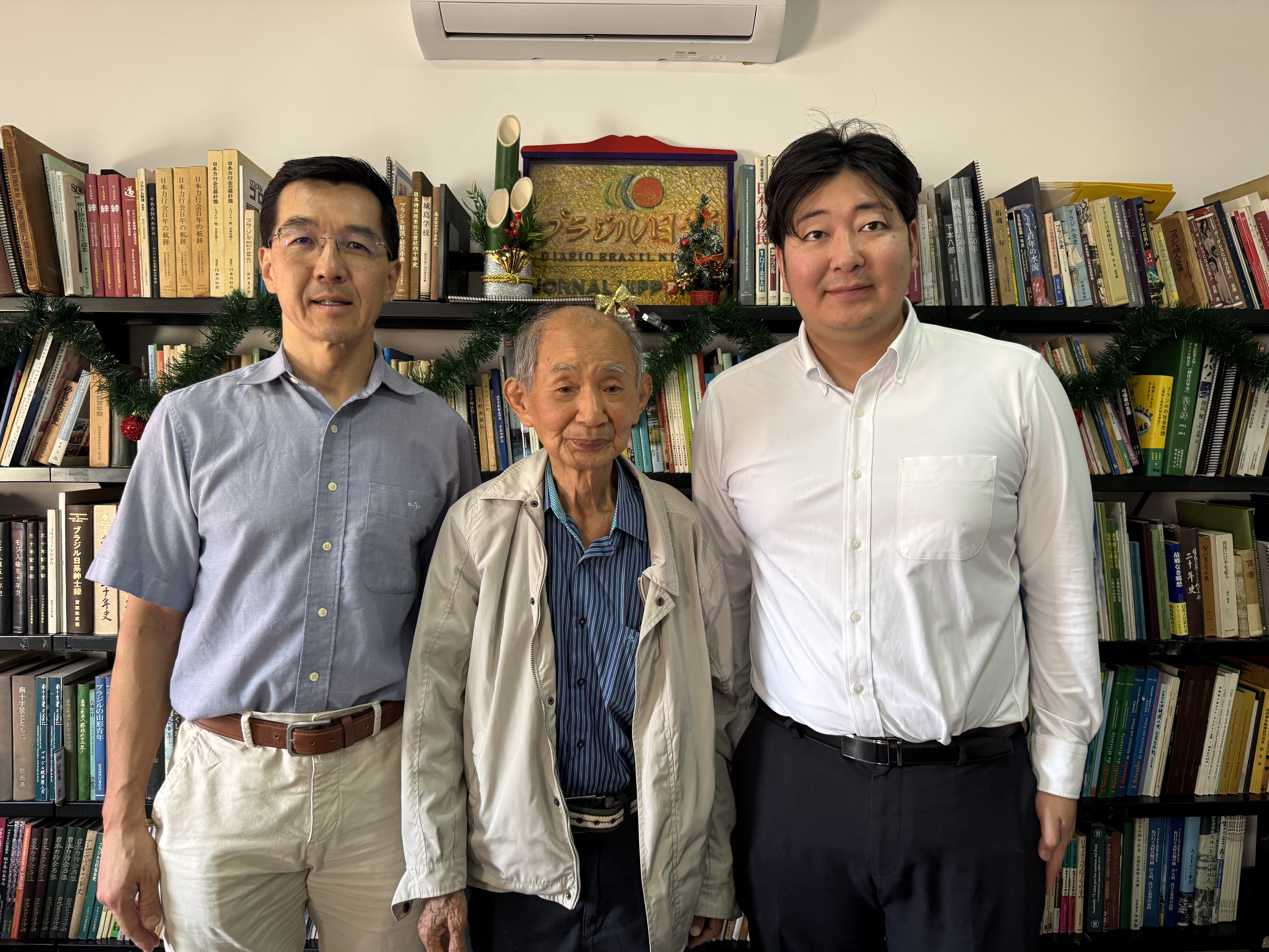 桜井副会長、谷野講師、蓮沼理事（左から）